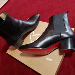 Christian Louboutin ankle boots.